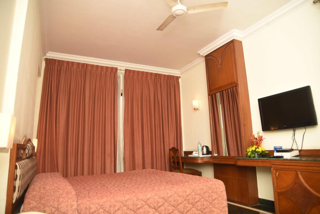 Hotel Maurya Бенґалуру Номер фото